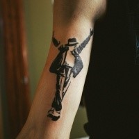 Blackwork style small arm tattoo of dancing Jackson