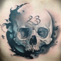 Blue black skull with numbers on forehead tattoo on chest