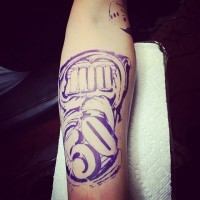 Blue colored big forearm tattoo of money bills numbers