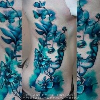 Blue colored large side tattoo of woman portrait and flowers