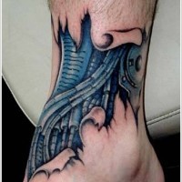 Blue mechanism under skin tattoo on leg
