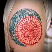 Blue red moon and sun mandala tattoo on shoulder