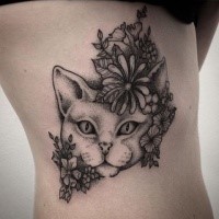 Breathtaking dot style side tattoo of cat with various wild flowers