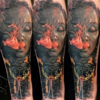 Breathtaking gorgeous looking forearm tattoo of smoking woman with snake