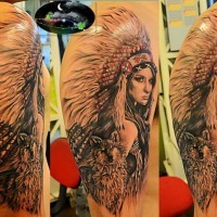 Breathtaking natural looking shoulder tattoo of Indian woman with wolf