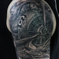 Breathtaking unbelievable realism style very detailed shoulder tattoo of fighter plane