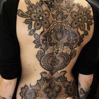 Breathtaking very detailed floral tattoo stylized with different ornaments tattoo on whole back