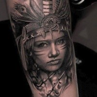 Breathtaking very detailed thigh tattoo of Indian woman with helmet