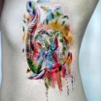 Bright multicolored elephant side tattoo in watercolor style