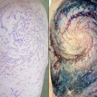 Brilliant colored realistic space tattoo on half sleeve zone