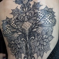 Brilliant painted and detailed massive floral tattoo with ornaments on whole back