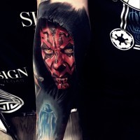 Brilliant painted very detailed colreod forearm tattoo of Darth Maul portrait