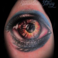 Brilliant very realistic looking big eye tattoo on shoulder by Samantha Storey