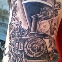 Carelessly painted black ink upper arm tattoo of big train