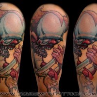 Cartoon colored big colored half sleeve tattoo of creepy clown with knife