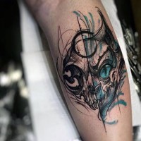 Cartoon like colored abstract evil alien tattoo on leg