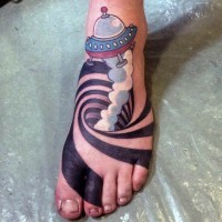 Cartoon like colored alien ship with hypnotic ornament tattoo on foot