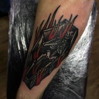 Cartoon like colored burning coffin with skeleton tattoo on arm