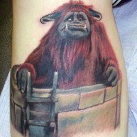 Cartoon like colored funny monster tattoo on leg