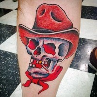 Cartoon like colored western cowboy skull with golden tooth and hat tattoo on leg