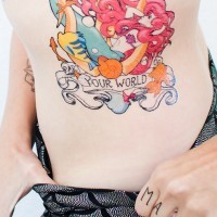 Cartoon mermaid Ariel and Flounder colored side tattoo with banner lettering