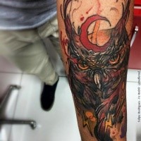 Cartoon style colored arm tattoo of big owl with moon