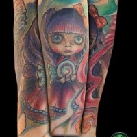 Cartoon style colored arm tattoo of cute doll with candy