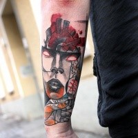 Cartoon style colored arm tattoo of demonic mask with bloody heart