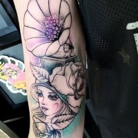 Cartoon style colored arm tattoo of woman with gramophone and big hat