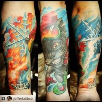 Cartoon style colored forearm tattoo of cool cat with snowboard glasses