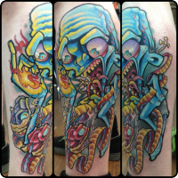 Cartoon style colored leg tattoo of creepy zombie with snake