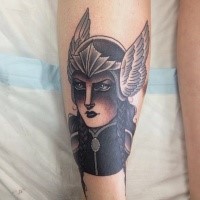Cartoon style colored leg tattoo of fantasy woman with cool helmet