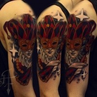 Cartoon style colored shoulder tattoo of woman with mask