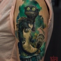 Cartoon style colored shoulder tattoo of funny looking animal