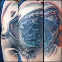 Cartoon style colored tattoo of astronaut skeleton with broken helmet