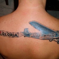 Cartoon style colored upper back tattoo of plane with lettering