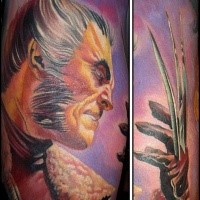 Cartoon style colored Wolverine tattoo