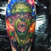 Cartoon style colored zombie monster tattoo on leg