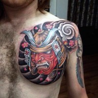 Cartoon style colorful funny samurai mask tattoo on chest with