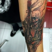 Cartoon style forearm tattoo of burning skeleton musician