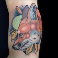 Cartoon style natural colored big fox tattoo on arm muscle