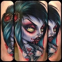 Cartoon style painted and colored bloody evil doll tattoo with little red heart