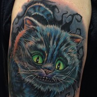 Smiling cheshire cat tattoo in colour