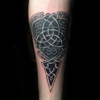 Celtic style black ink arm tattoo of knots