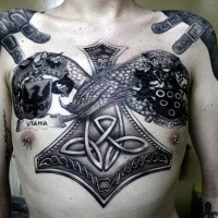 Celtic style colored chest tattoo of fantasy snake with emblem