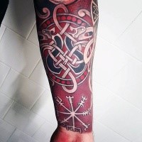 Celtic style colored forearm tattoo of various symbols