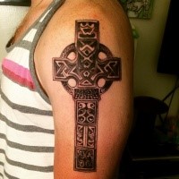 Celtic style colored shoulder tattoo of large cross