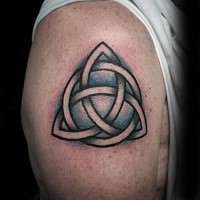 Celtic style colored shoulder tattoo of big knot