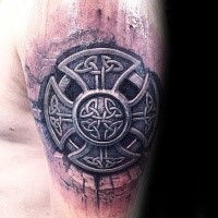 Celtic style detailed shoulder tattoo of large cross