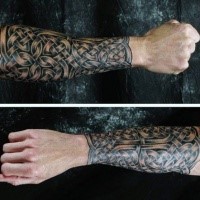 Celtic style typical designed forearm tattoo